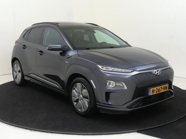 Hyundai Kona EV Premium 64 kWh | Navigatie | Elektrisch schuifdak | Stoelverwarming | Climate control | Camera |