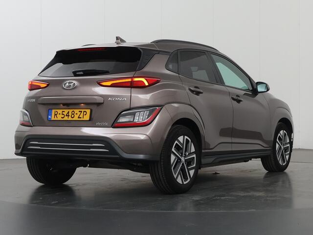 Hyundai Kona EV Fashion 39 kWh | SOH 98% | Adaptieve Cruise Control | LED | Camera | DAB | Keyless Entry/Go | HUD | Warmtepomp | Dodehoek detectie |