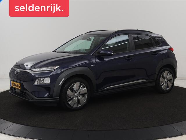Hyundai Kona EV Fashion 64 kWh | 3-Fase | SOH 100% | Head-Up | Adaptive cruise | Carplay | Warmtepomp | Camera | Krell Audio | Navigatie | Parkeerhulp