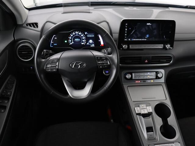 Hyundai Kona EV Fashion 64 kWh | 3-Fase | SOH 100% | Head-Up | Adaptive cruise | Carplay | Warmtepomp | Camera | Krell Audio | Navigatie | Parkeerhulp
