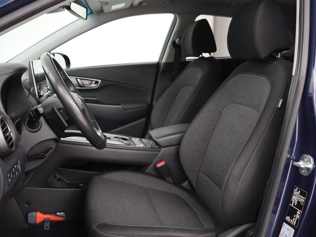 Hyundai Kona EV Fashion 64 kWh | 3-Fase | SOH 100% | Head-Up | Adaptive cruise | Carplay | Warmtepomp | Camera | Krell Audio | Navigatie | Parkeerhulp