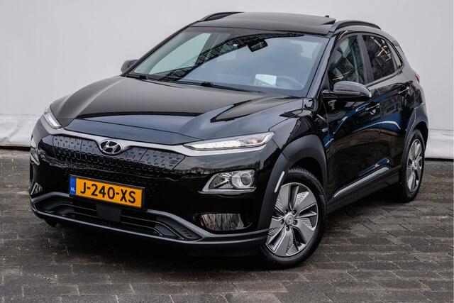 Hyundai Kona EV Fashion 64 kWh Trekhaak/ Schuif-kanteldak/ Stoelverwarming/ Half lederen int./ HUD/ Blindspot