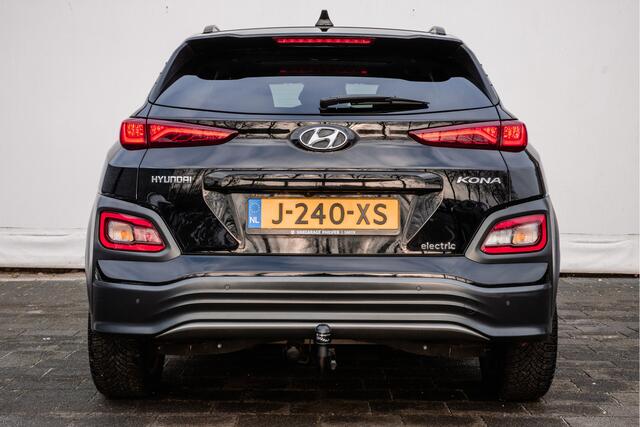 Hyundai Kona EV Fashion 64 kWh Trekhaak/ Schuif-kanteldak/ Stoelverwarming/ Half lederen int./ HUD/ Blindspot
