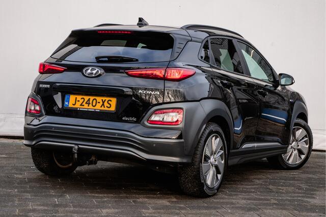 Hyundai Kona EV Fashion 64 kWh Trekhaak/ Schuif-kanteldak/ Stoelverwarming/ Half lederen int./ HUD/ Blindspot