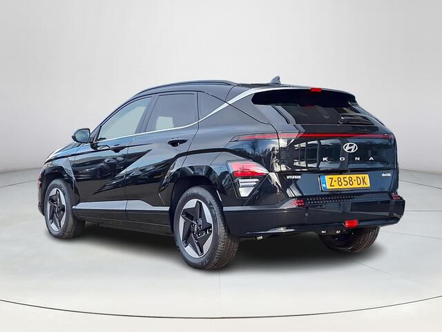 Hyundai Kona Electric Comfort Smart 65.4 kWh | Apple Carplay/ Android Auto | Stoelverwarming/stuurverwarming | Achteruitrijcamera | Head-up Display | Navigatie | Elektrische achterklep |