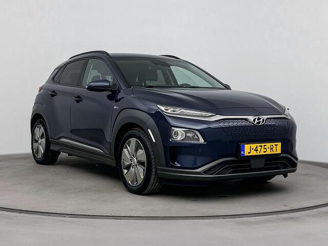Hyundai Kona EV Premium 64 kWh | Soh 96,5 % | Navigatie, Apple car play Android auto| stoel verwarming en koeling |