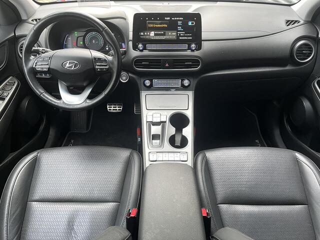 Hyundai Kona EV Premium 64 kWh | SCHUIFKANTELDAK | LEDEREN BEKLEDING | HEAD UP DISPLAY | ADAPTIEVE CRUISECONTROL | GEÏNTEGREERDE NAVIGATIESYSTEEM | MULTIMEDIA APPLE CARPLAY & ANDROID AUTO |