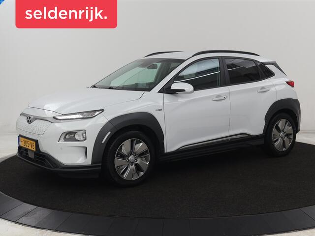 Hyundai Kona EV Premium 64 kWh | SOH 100% | 3 Fase | Stoelventilatie | Leder | Head-Up | Warmtepomp | Trekhaak | Achterbankverwarming | Adaptive cruise | Camera | Carplay | Full LED