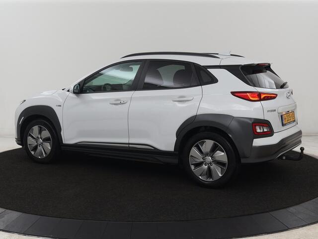 Hyundai Kona EV Premium 64 kWh | SOH 100% | 3 Fase | Stoelventilatie | Leder | Head-Up | Warmtepomp | Trekhaak | Achterbankverwarming | Adaptive cruise | Camera | Carplay | Full LED