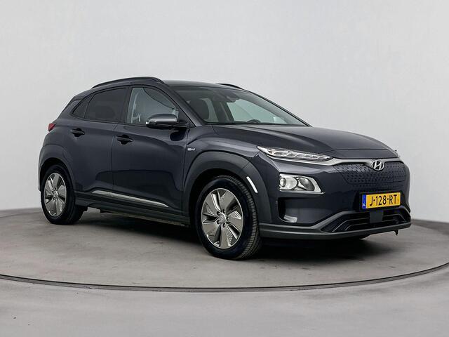 Hyundai Kona EV Fashion 64 kWh | Head Up Display | SOH 95.5% | Half Leder | Dode Hoek Detectie | Stoelverwarming & Verkoeling | Lane Assist |