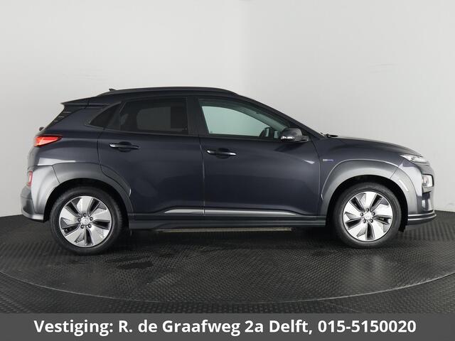 Hyundai Kona EV Premium 64 kWh | Schuif-Kanteldak | Stuur-& Stoelverwarming | Apple Carplay&AndroidAUTO | Leder | Camera |