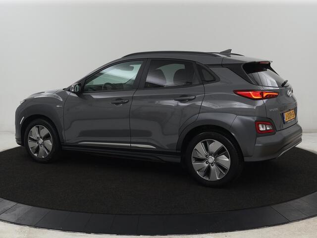 Hyundai Kona EV Premium 64 kWh | SOH 100% | 3 Fase | Stoelventilatie | Leder | Head-Up | Warmtepomp | Camera | Achterbankverwarming | Carplay | Navigatie | Adaptive cruise | Keyless | Parkeerhulp