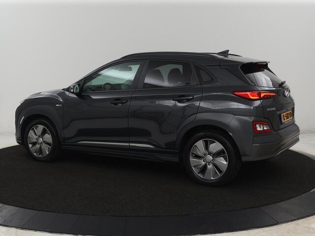 Hyundai Kona EV Limited 64 kWh | SOH 100% | 3 Fase | Stoelventilatie | Head-Up | Adaptive cruise | Camera | Leder | Carplay | Achterbankverwarming | Warmtepomp | Keyless | Full LED | Dodehoek detectie