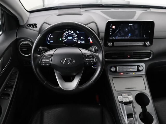 Hyundai Kona EV Limited 64 kWh | SOH 100% | 3 Fase | Stoelventilatie | Head-Up | Adaptive cruise | Camera | Leder | Carplay | Achterbankverwarming | Warmtepomp | Keyless | Full LED | Dodehoek detectie