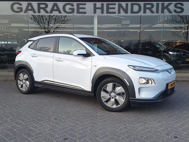 Hyundai Kona EV Fashion 64 kWh | SOH: 96,4% | 3 Fase | Warmtepomp | HUD | Navi | Adaptive CC | Blindspot |