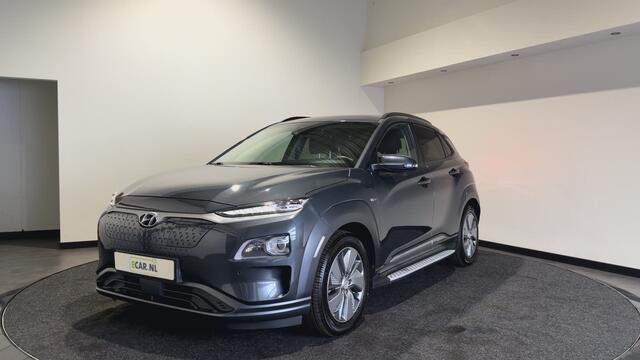 Hyundai Kona EV Premium 64 kWh | Voorstoelen verwarmd & gekoeld | Trekhaak | Warmtepomp | Soh (batterijcheck) Waarde 90,4 %