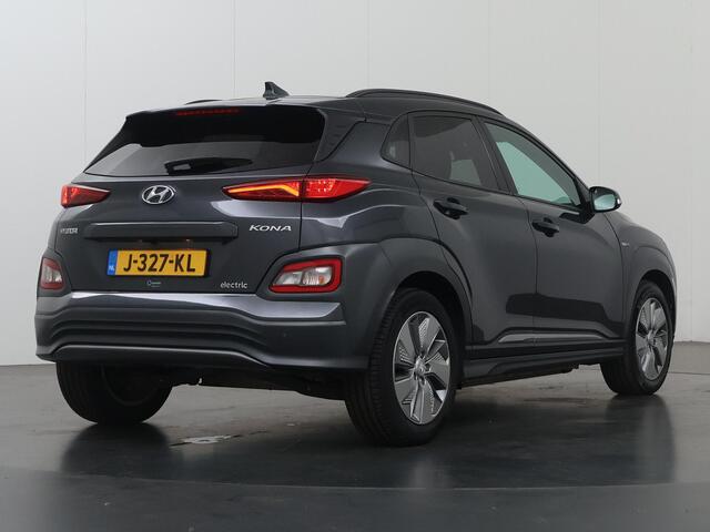 Hyundai Kona EV Fashion 64 kWh | SOH 96% | HUD | Navigatie | Camera | DAB | Apple CarPlay/ Android Auto | Adaptieve Cruise Control | KRELL Audio |