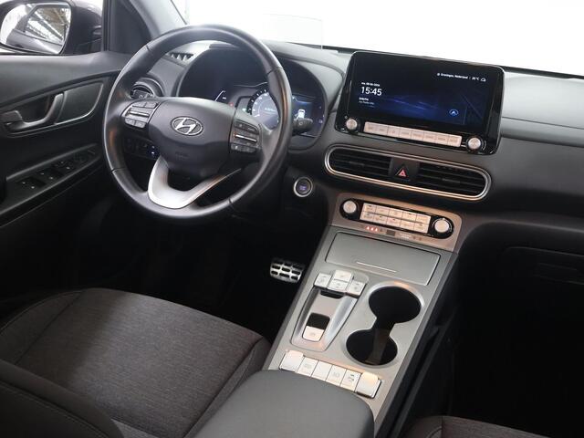 Hyundai Kona EV Fashion 64 kWh | SOH 96% | HUD | Navigatie | Camera | DAB | Apple CarPlay/ Android Auto | Adaptieve Cruise Control | KRELL Audio |