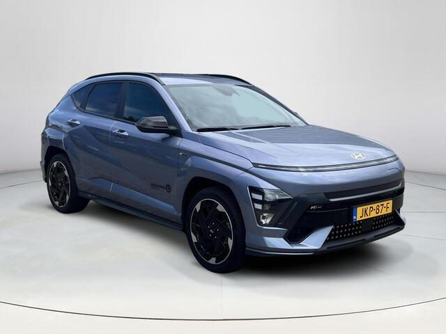 Hyundai Kona Electric N Line Business 64.8 kWh | Uit voorraad leverbaar! | Adaptieve Cruise Control | Parkeersensoren voor en achter | Dodehoekdetectie | Navigatie | Stoel / Stuurverwarming | Keyless entry en start| Uit Voorraad Leverbaar |