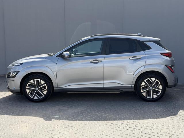 Hyundai Kona EV Comfort 39 kWh / Accu SOH 91% / Warmtepomp / Navigatie / Adaptieve Cruise / CCS Laden / Dodehoek Detectie / Camera / PDC / Krell Audio / Apple Carplay & Android Auto /