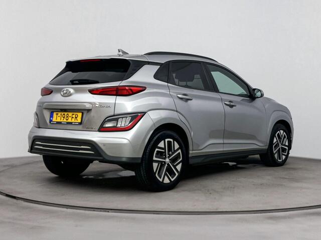 Hyundai Kona EV Fashion 64 kWh | SOH 96.4% | Achteruitrij camera | Navigatie | Parkeersensoren | Head up display |
