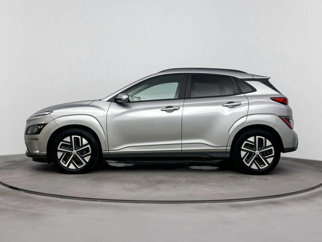 Hyundai Kona EV Fashion 64 kWh | SOH 96.4% | Achteruitrij camera | Navigatie | Parkeersensoren | Head up display |