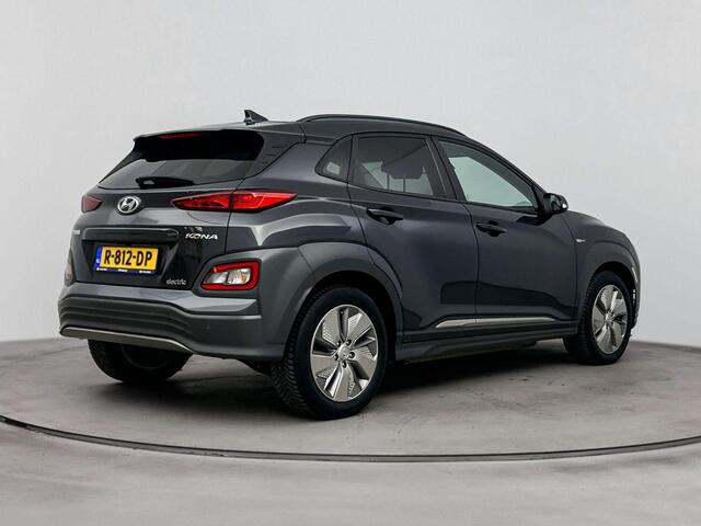 Hyundai Kona EV COMFORT SMART 64 kWh | SOH 95.1% | NAVIGATIE | HUD | STOEL/STUURVERWARMING | ACHTERUITRIJ CAMERA |