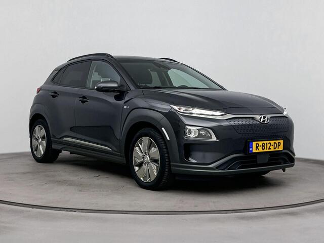 Hyundai Kona EV COMFORT SMART 64 kWh | SOH 95.1% | NAVIGATIE | HUD | STOEL/STUURVERWARMING | ACHTERUITRIJ CAMERA |