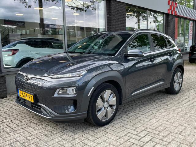 Hyundai Kona EV Premium 64 kWh | SOH 100% | Stoelverw. + ventilatie | Prem. audio | Adpt. cruise