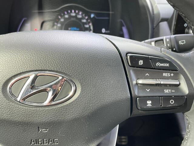 Hyundai Kona EV Premium 64 kWh | SOH 100% | Stoelverw. + ventilatie | Prem. audio | Adpt. cruise