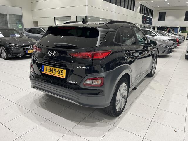 Hyundai Kona EV Fashion 64 kWh | SOH 91,6% | Navi | Adaptieve cruise control, Camera | Dodehoek bewaking Keyless entry | Apple carplay Android auto