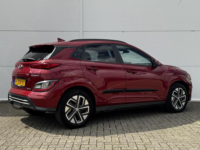 Hyundai Kona EV Fashion 64 kWh / SOH 100% / Stoelverwarming / Trekhaak / Apple Carplay/Android Auto / Cruise Control Adaptief