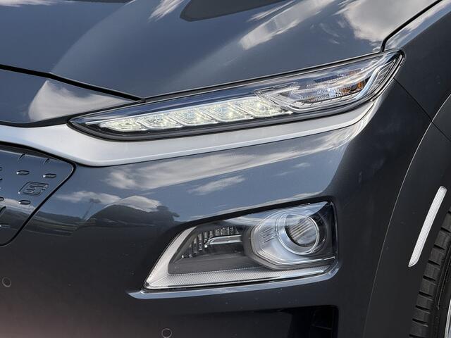 Hyundai Kona EV Premium 64 kWh Leer / Head-Up / Stoel verwarming & Koeling / Winterbanden