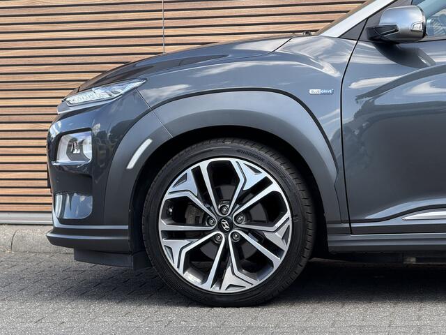 Hyundai Kona EV Premium 64 kWh Leer / Head-Up / Stoel verwarming & Koeling / Winterbanden