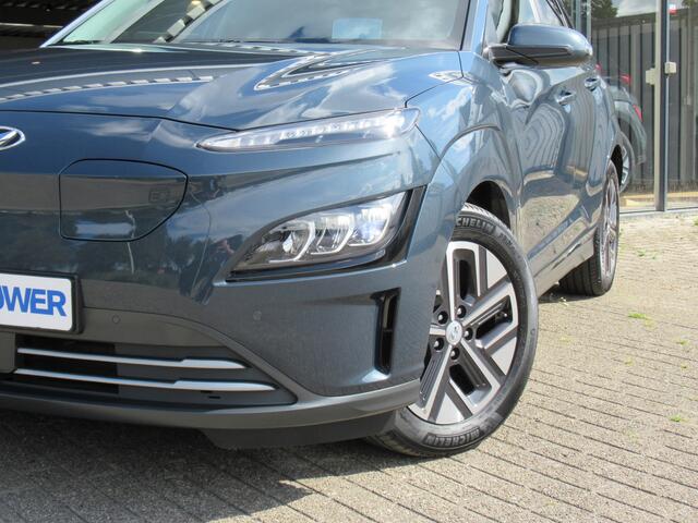 Hyundai Kona EV Premium 64 kWh | 3 fase | warmtepomp 1e eigen | full option! | leder | head-up | elektr.stoelen| adpt.cruise