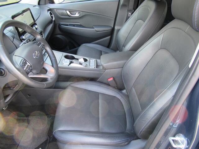 Hyundai Kona EV Premium 64 kWh | 3 fase | warmtepomp 1e eigen | full option! | leder | head-up | elektr.stoelen| adpt.cruise