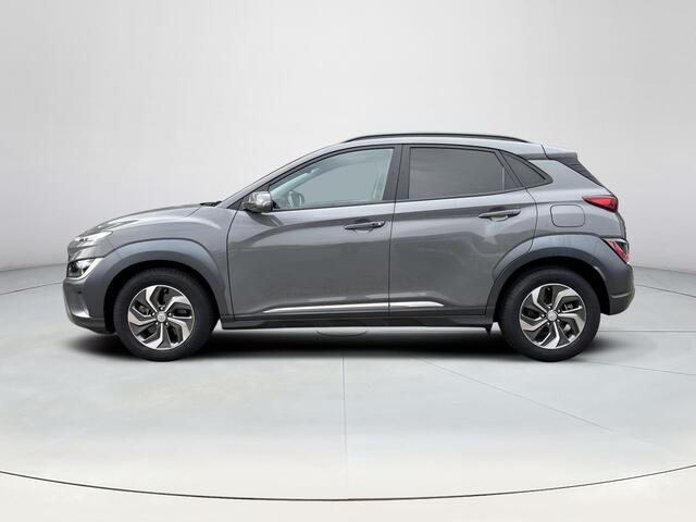 Hyundai Kona 1.6 GDI HEV Fashion Sky | SChuif- kanteldak | Trekhaak | Head-up display | Adaptieve cruise control | Dodehoekdetectie |