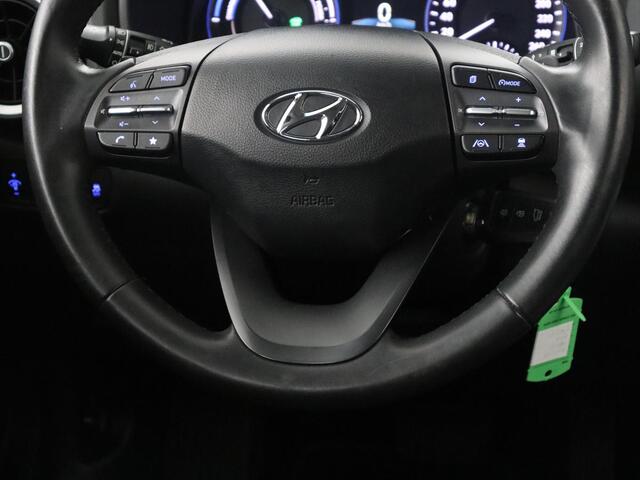 Hyundai Kona 1.6 GDI HEV Comfort Smart | Trekhaak | Adaptive cruise | Camera | Carplay | KRELL sound | Full LED | Park assist | Climate control | Navigatie |