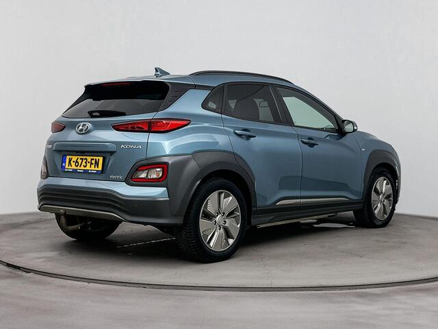 Hyundai Kona EV Fashion 64 kWh | SOH 96.1% | Trekhaak fietsendrager | Achteruitrij camera | Dodehoek detectie | Stoelverwarming |