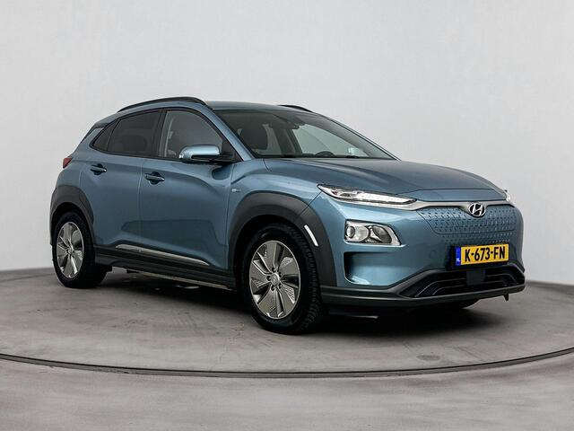 Hyundai Kona EV Fashion 64 kWh | SOH 96.1% | Trekhaak fietsendrager | Achteruitrij camera | Dodehoek detectie | Stoelverwarming |