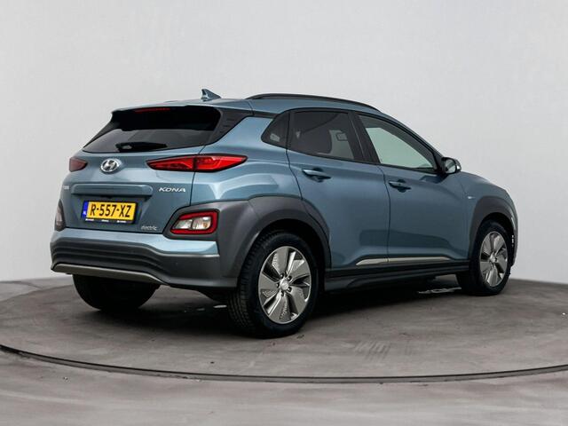 Hyundai Kona EV Comfort 64 kWh | SOH 96.1% | Parkeersensoren | Stoel / Stuurverwarming | Half lederen bekleding | – foto 2