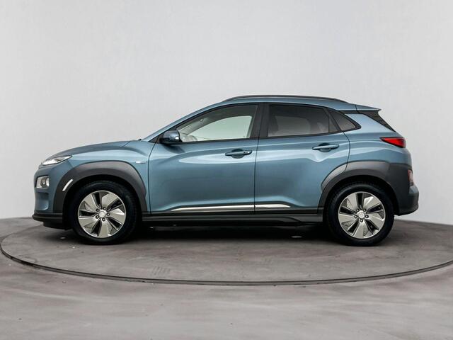 Hyundai Kona EV Comfort 64 kWh | SOH 96.1% | Parkeersensoren | Stoel / Stuurverwarming | Half lederen bekleding | – foto 5