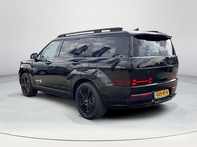 Hyundai SANTA FE 1.6 T-GDI PHEV Black Line 4WD 7p. | Apple Carplay/ Android Auto | Trekhaak | Elektrische achterklep | Stoel/stuurverwarming | Draadloos opladen | Adaptief Cruise Control | Elektrische verstelbare stoelen | Head-up display |