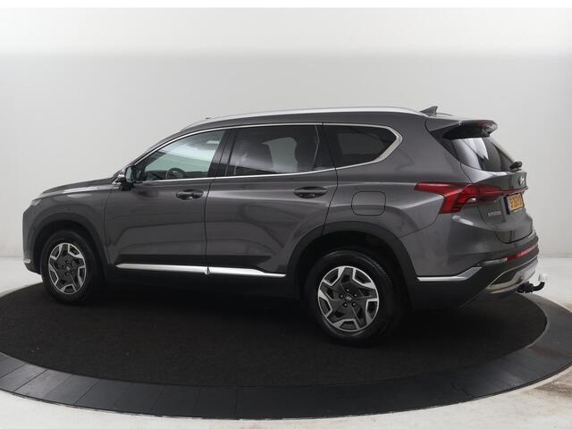 Hyundai SANTA FE 1.6 T-GDI HEV Comfort Smart Sky 7p | Panoramadak | Leder | Stoelverwarming | Adaptive cruise | Climate control | Carplay | Camera | Park assist | Trekhaak