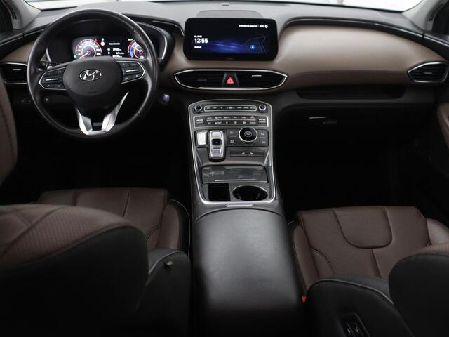 Hyundai SANTA FE 1.6 T-GDI HEV Comfort Smart Sky 7p | Panoramadak | Leder | Stoelverwarming | Adaptive cruise | Climate control | Carplay | Camera | Park assist | Trekhaak