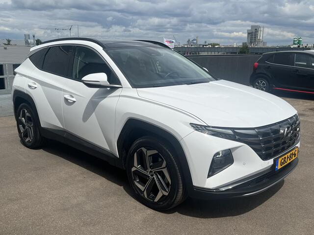 Hyundai TUCSON 1.6 T-GDI PHEV Premium Sky 4WD Schuif/kanteldak, Navigatie, Stoelverwarming, Parkeersensoren voor + Achter, Dodehoekdetectie, Climate control, BTW-Auto