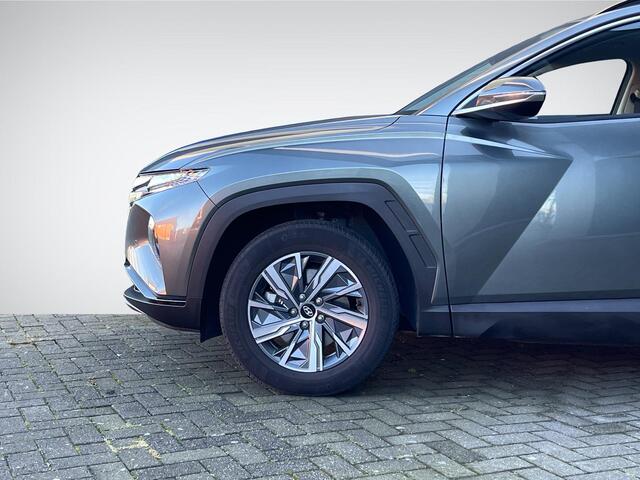 Hyundai TUCSON 1.6 T-GDI HEV Comfort Smart | Navigatie | Camera | Stuur- + Stoelverwarming | Elek. Achterklep | Premium Audio | Rijklaarprijs!