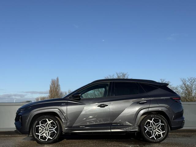 Hyundai TUCSON 1.6 T-GDI 265 PK PHEV Premium 4WD | Schuifkanteldak 'Pano' | Alcantara | Blind spot camera | N-Line Pack | Vierwielaandrijving |