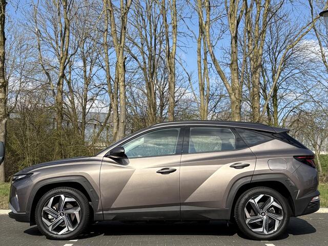 Hyundai TUCSON 1.6 T-GDI 265PK PHEV Comfort 4WD | 19''Lmv & Allseason banden | Cruisecontrol | Geïntegreerde navigatiesysteem | Pdc & Camera | 1350 kg Trekvermogen |