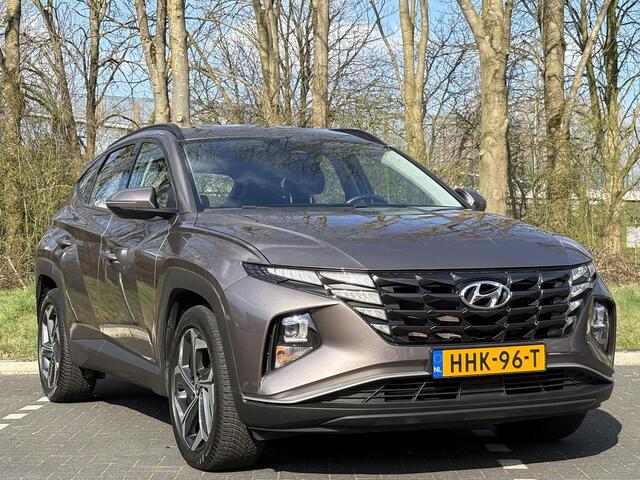 Hyundai TUCSON 1.6 T-GDI 265PK PHEV Comfort 4WD | 19''Lmv & Allseason banden | Cruisecontrol | Geïntegreerde navigatiesysteem | Pdc & Camera | 1350 kg Trekvermogen |